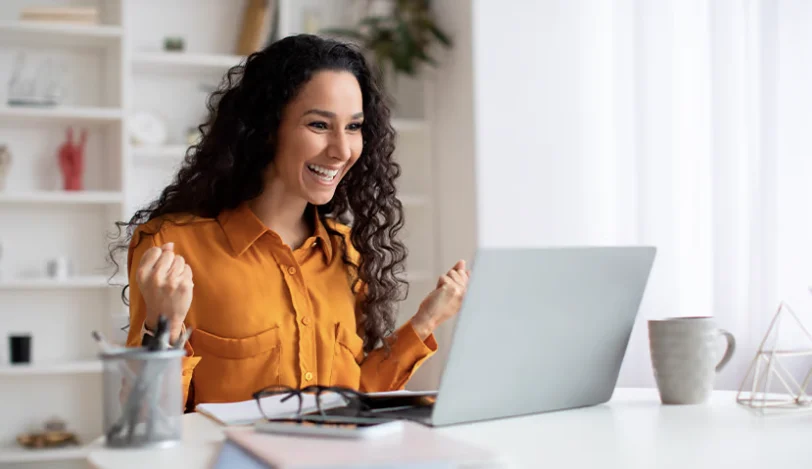 Business owner looking happy 812x469