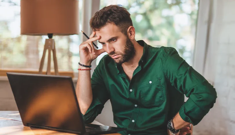 Business owner looking unhappy 812x469